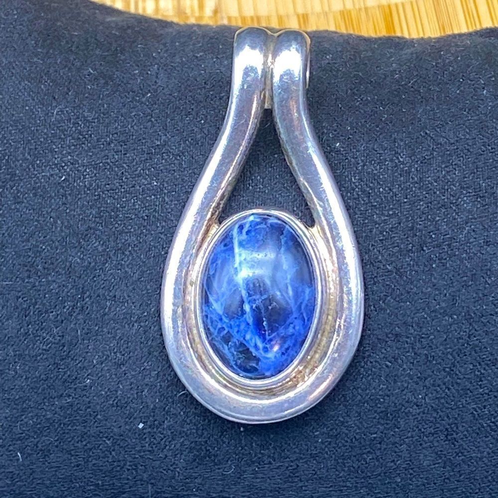 Ladies 925 pendant 1 1/2” long with a 3/4”x1/2” Sodalite stone.  Without chain